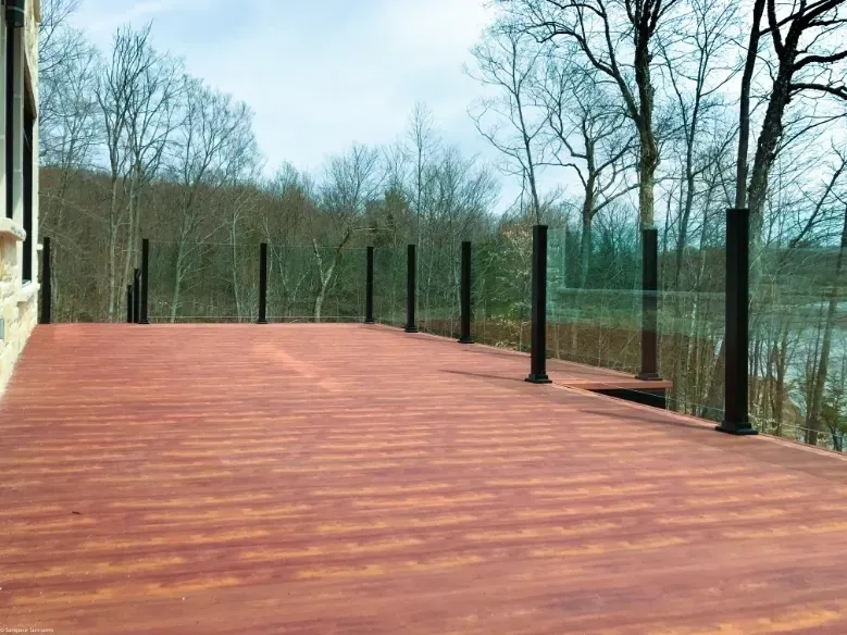 Wooden deck with glass railing