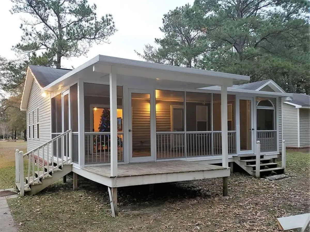 Cozy house with lit porch