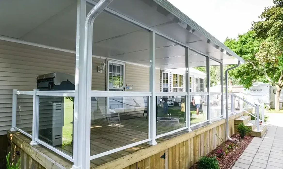 Enclosed porch with white railing