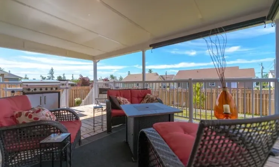 Outdoor seating area with barbecue grill