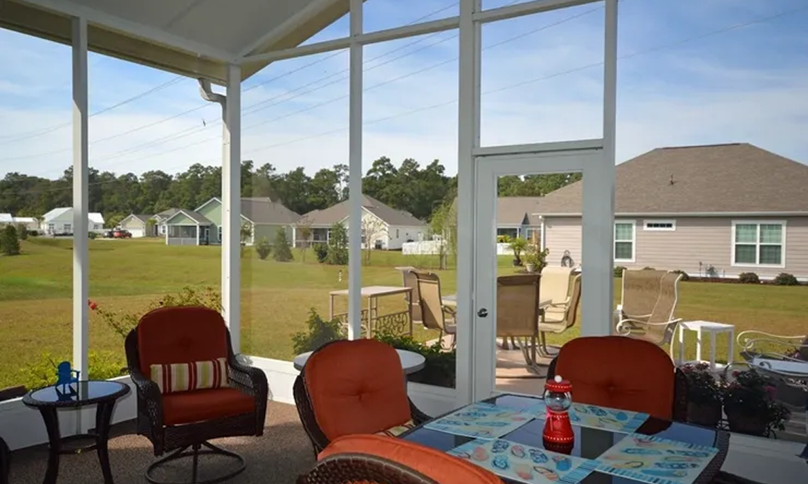 Screened patio with outdoor furniture