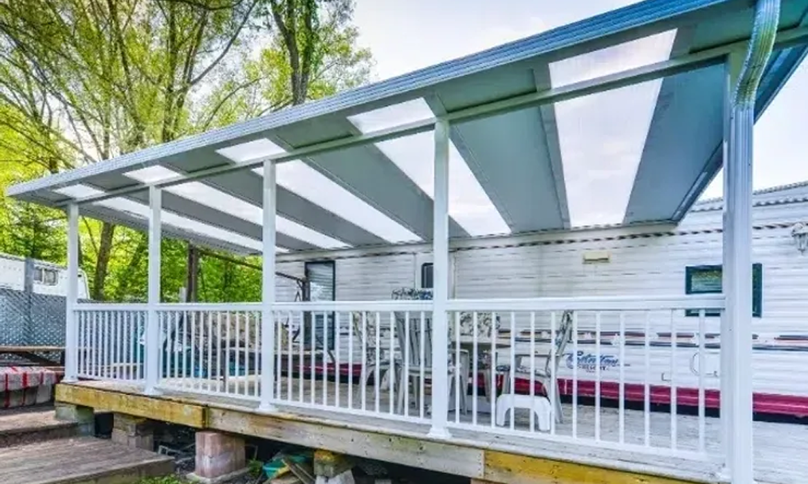 White railing on mobile home porch