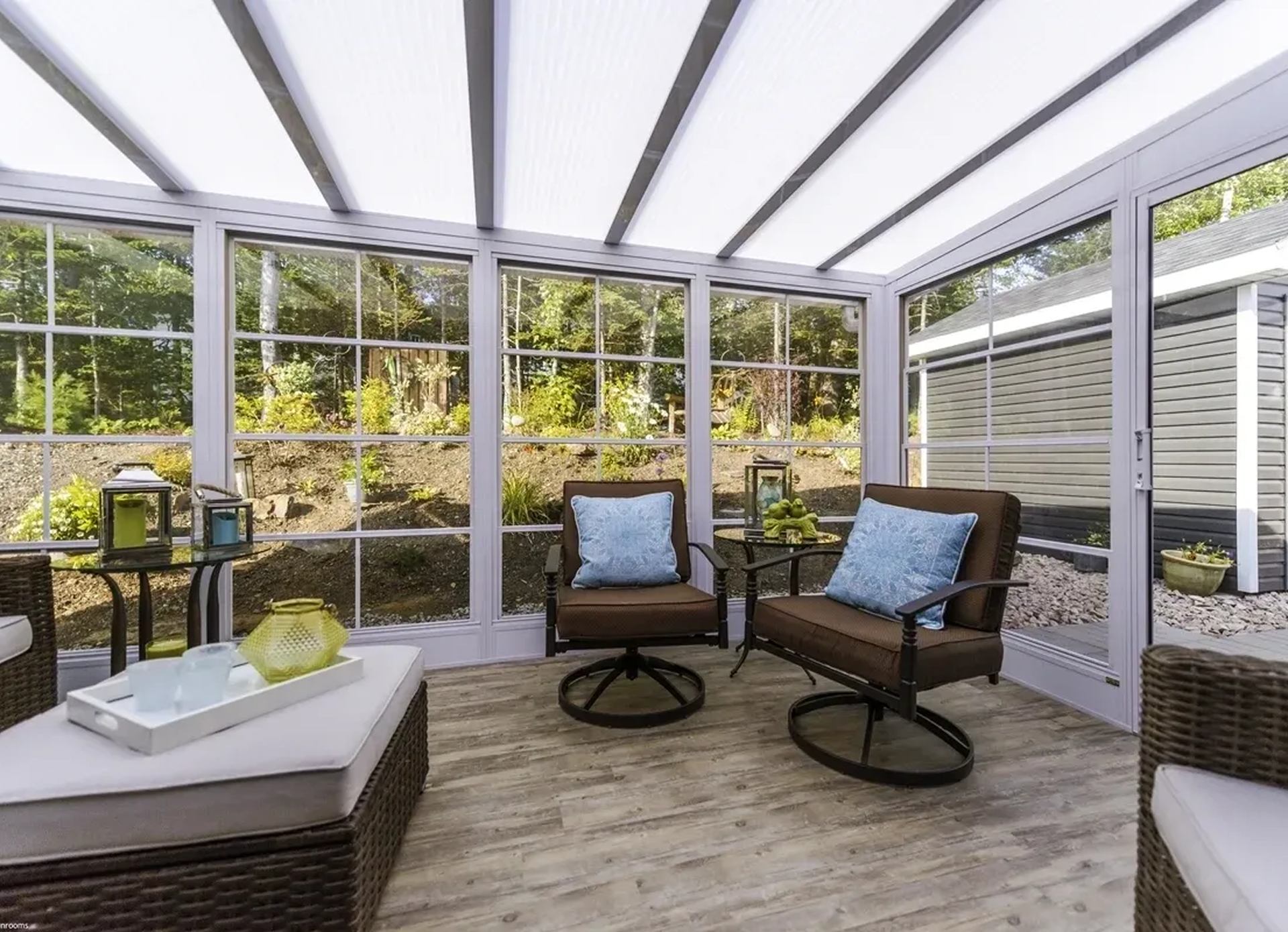Sunlit conservatory with wicker furniture
