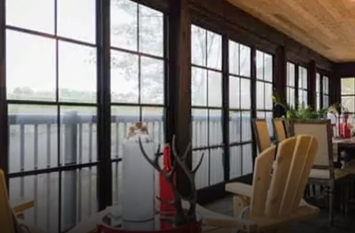 Rustic dining area with large windows
