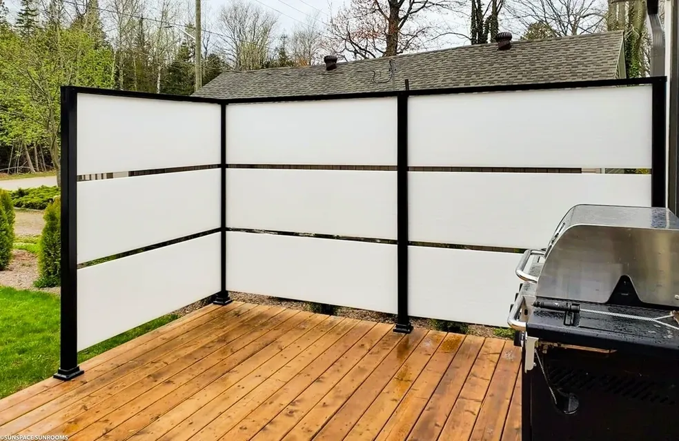 Outdoor privacy screens on wooden deck