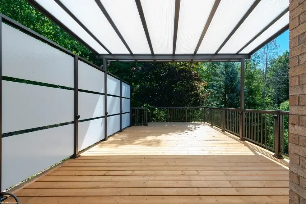 Wooden deck with modern roof