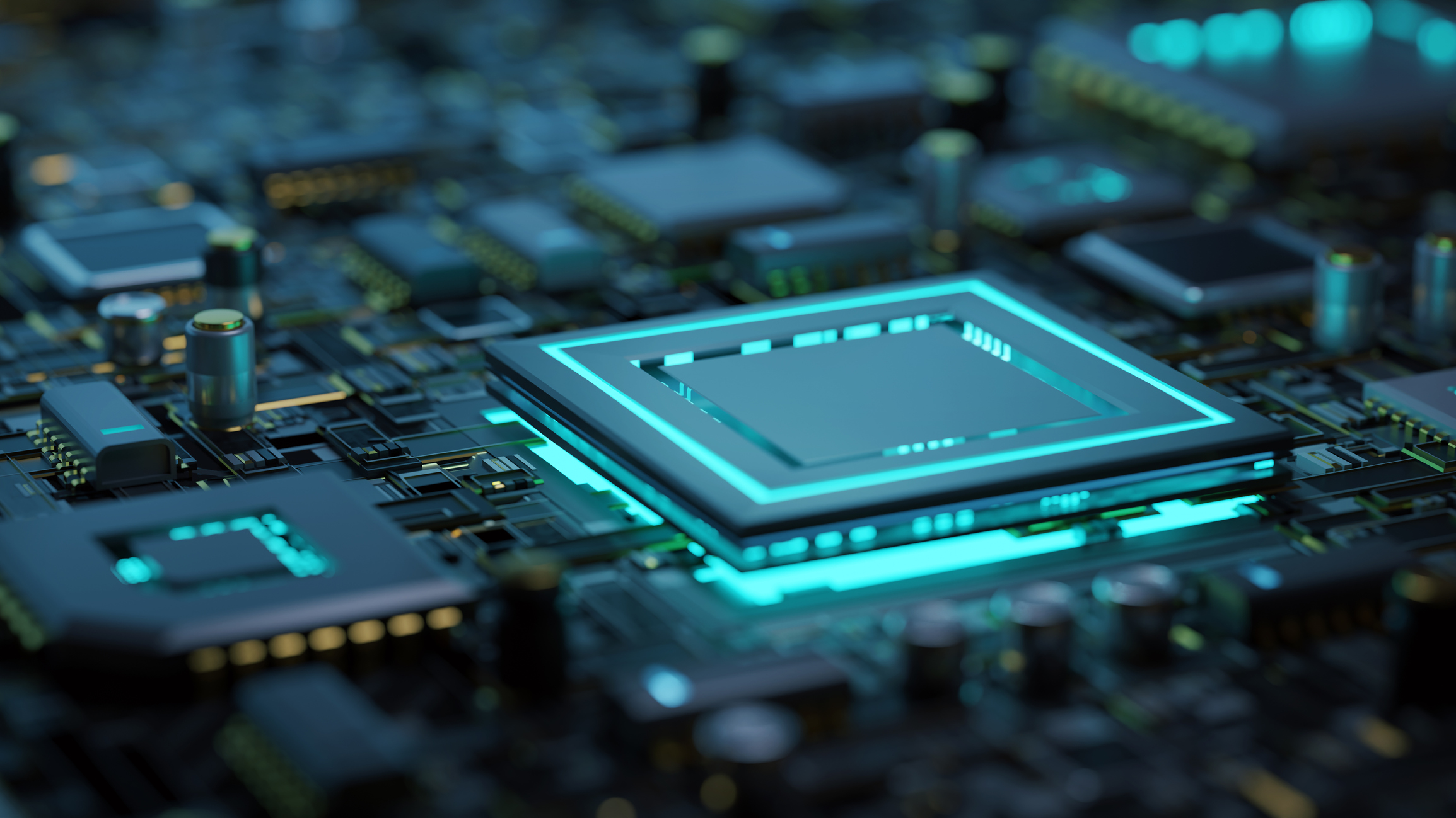 Close up of motherboard with selective focus on the main processor / micro chip with cyan backlit