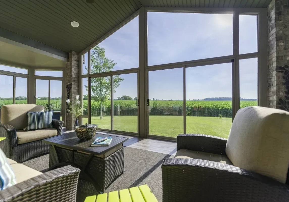 Bright room with wicker furniture and views
