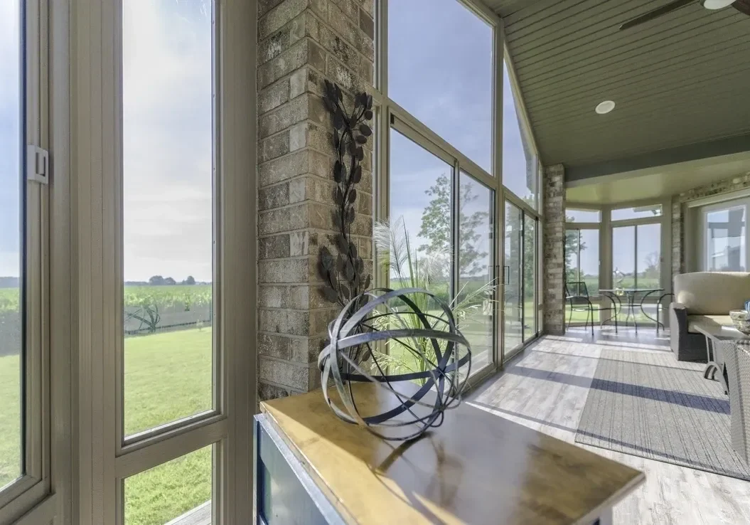 Sunlit room with large windows