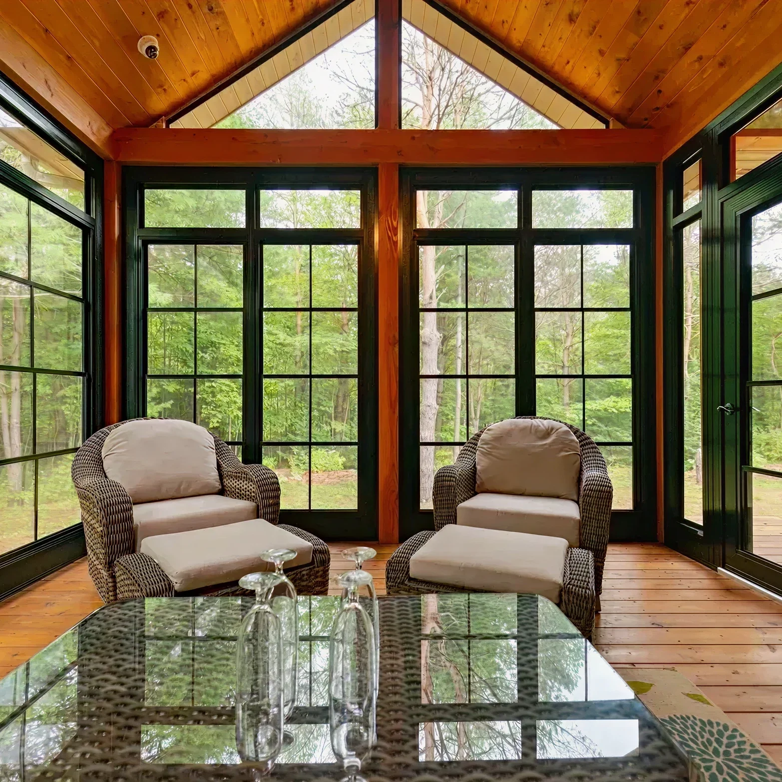 Bright room overlooking lush greenery